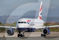 Diverse aircraft on the takeoff runway at Barcelona Airport