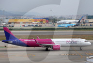 Diverse aircraft on the takeoff runway