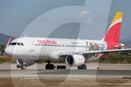 Diverse aircraft on the takeoff runway at Barcelona Airport