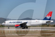 Diverse aircraft on the takeoff runway at Barcelona Airport