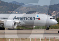 Diverse aircraft on the takeoff runway at Barcelona Airport