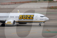 Diverse aircraft on the takeoff runway at Barcelon aAirport