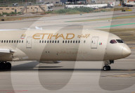 Diverse aircraft on the takeoff runway at Barcelona Airport