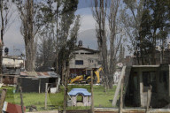 Partial Canal Overflow In La Ciénega In Tláhuac, Mexico City, Causing Serious Damage To Homes