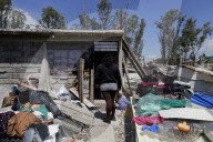 Partial Canal Overflow In La Ciénega In Tláhuac, Mexico City, Causing Serious Damage To Homes