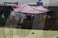 Partial Canal Overflow In La Ciénega In Tláhuac, Mexico City, Causing Serious Damage To Homes