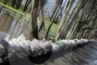 Partial Canal Overflow In La Ciénega In Tláhuac, Mexico City, Causing Serious Damage To Homes