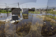 Partial Canal Overflow In La Ciénega In Tláhuac, Mexico City, Causing Serious Damage To Homes