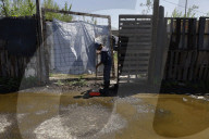 Partial Canal Overflow In La Ciénega In Tláhuac, Mexico City, Causing Serious Damage To Homes