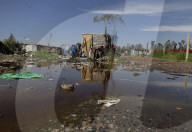 Partial Canal Overflow In La Ciénega In Tláhuac, Mexico City, Causing Serious Damage To Homes