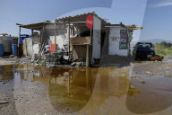 Partial Canal Overflow In La Ciénega In Tláhuac, Mexico City, Causing Serious Damage To Homes
