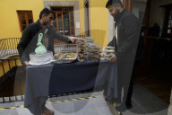 Members Of The Abed Family, Refugees From Palestine, Offer Authentic Palestinian Food For Sale In Mexico City