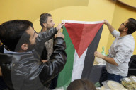 Members Of The Abed Family, Refugees From Palestine, Offer Authentic Palestinian Food For Sale In Mexico City