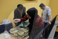 Members Of The Abed Family, Refugees From Palestine, Offer Authentic Palestinian Food For Sale In Mexico City