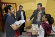 Members Of The Abed Family, Refugees From Palestine, Offer Authentic Palestinian Food For Sale In Mexico City