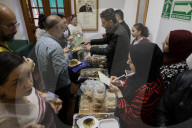 Members Of The Abed Family, Refugees From Palestine, Offer Authentic Palestinian Food For Sale In Mexico City