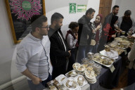 Members Of The Abed Family, Refugees From Palestine, Offer Authentic Palestinian Food For Sale In Mexico City