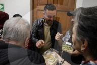 Members Of The Abed Family, Refugees From Palestine, Offer Authentic Palestinian Food For Sale In Mexico City
