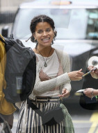 Actress Zazie Beetz shows off her unique style with underwear on full display and striped trousers
