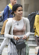 Actress Zazie Beetz shows off her unique style with underwear on full display and striped trousers