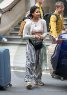 Actress Zazie Beetz shows off her unique style with underwear on full display and striped trousers