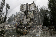 A Residential Building Destroyed By A Direct Hit From A Russian Cruise Missile  In Kyiv