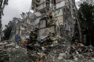 A Residential Building Destroyed By A Direct Hit From A Russian Cruise Missile  In Kyiv