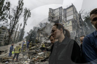 A Residential Building Destroyed By A Direct Hit From A Russian Cruise Missile  In Kyiv