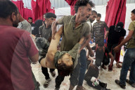 Gazans bring wounded and dead to Al-Awda hospital