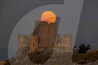 Sturgeon Full Moon Rising Behind Rocca Calascio, Italy