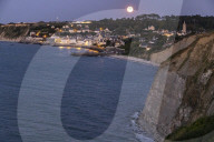 Sturgeon Full Moon Rises Over Normandy