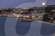 Sturgeon Full Moon Rises Over Normandy