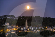 Sturgeon Full Moon Rises Over Normandy