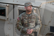 Members Of The DC National Guard Assembled With Military Vehicles In Front Of The Washington Monument