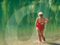 Woman By Lake