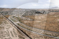 DHS Secretary Kristi Noem visits border wall, paints it black