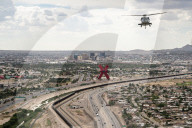 DHS Secretary Kristi Noem visits border wall, paints it black