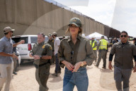 DHS Secretary Kristi Noem visits border wall, paints it black