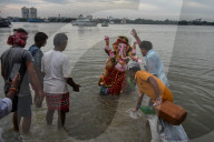 Ganesh Idols Immersion In River Ganges In Kolkata. 