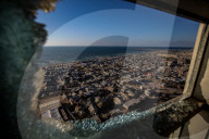 Gaza tent camps amidst bombed out buildings