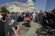 Rally Held Outside U.S. Capitol In Solidarity With Epstein Victims