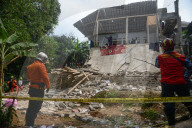 Hall Building Collapse Kills 3, Injures Dozens In Indonesia