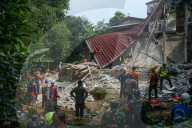 Hall Building Collapse Kills 3, Injures Dozens In Indonesia