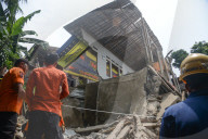 Hall Building Collapse Kills 3, Injures Dozens In Indonesia