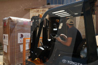 The Syrian Minister Of Health And The Qatari Ambassador Receive A Qatari Airlift Of Aid To Syria.
