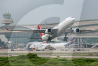 Diverse aircraft taking off from Barcelona Airport