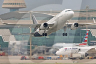 Diverse aircraft taking off from Barcelona Airport