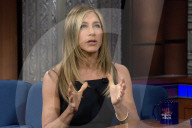 Aniston shows puppy love