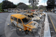 Burned-out Vehicles And Vandalized Buildings Are Seen At The Premises Of Singha Durbar