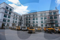 Burned-out Vehicles And Vandalized Buildings Are Seen At The Premises Of Singha Durbar